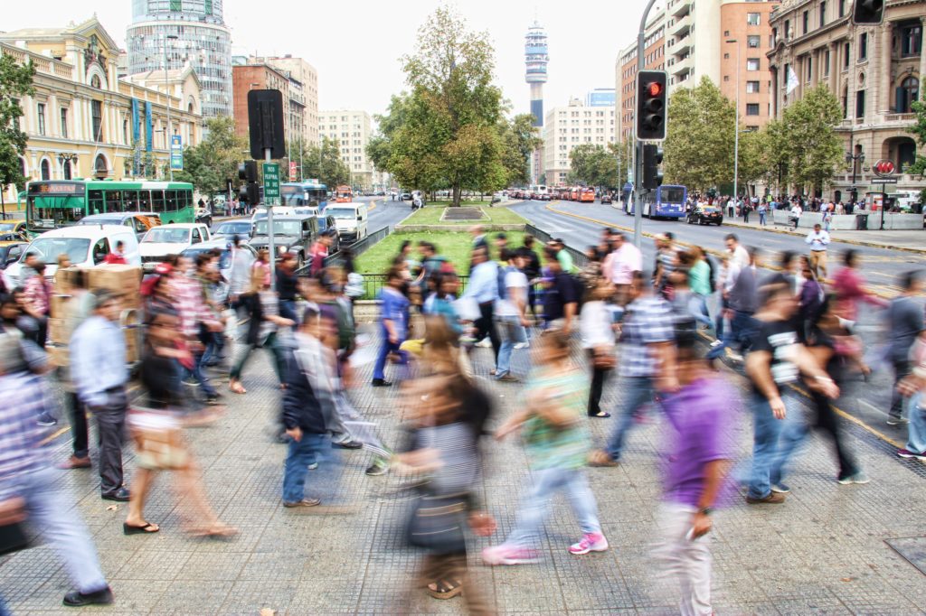 People crossing a city street.