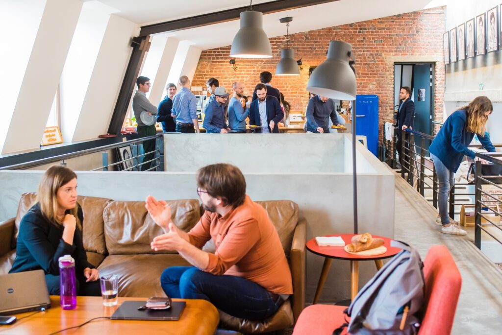 People meeting together in a cafeteria.