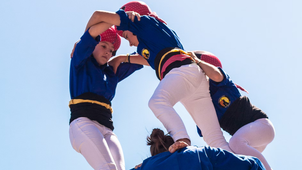 Youths participating in a trust-building exercise.